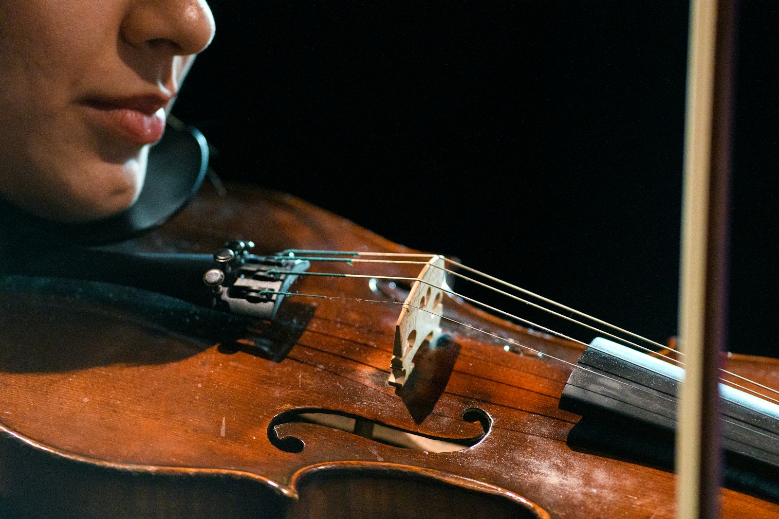 a person playing a violin
